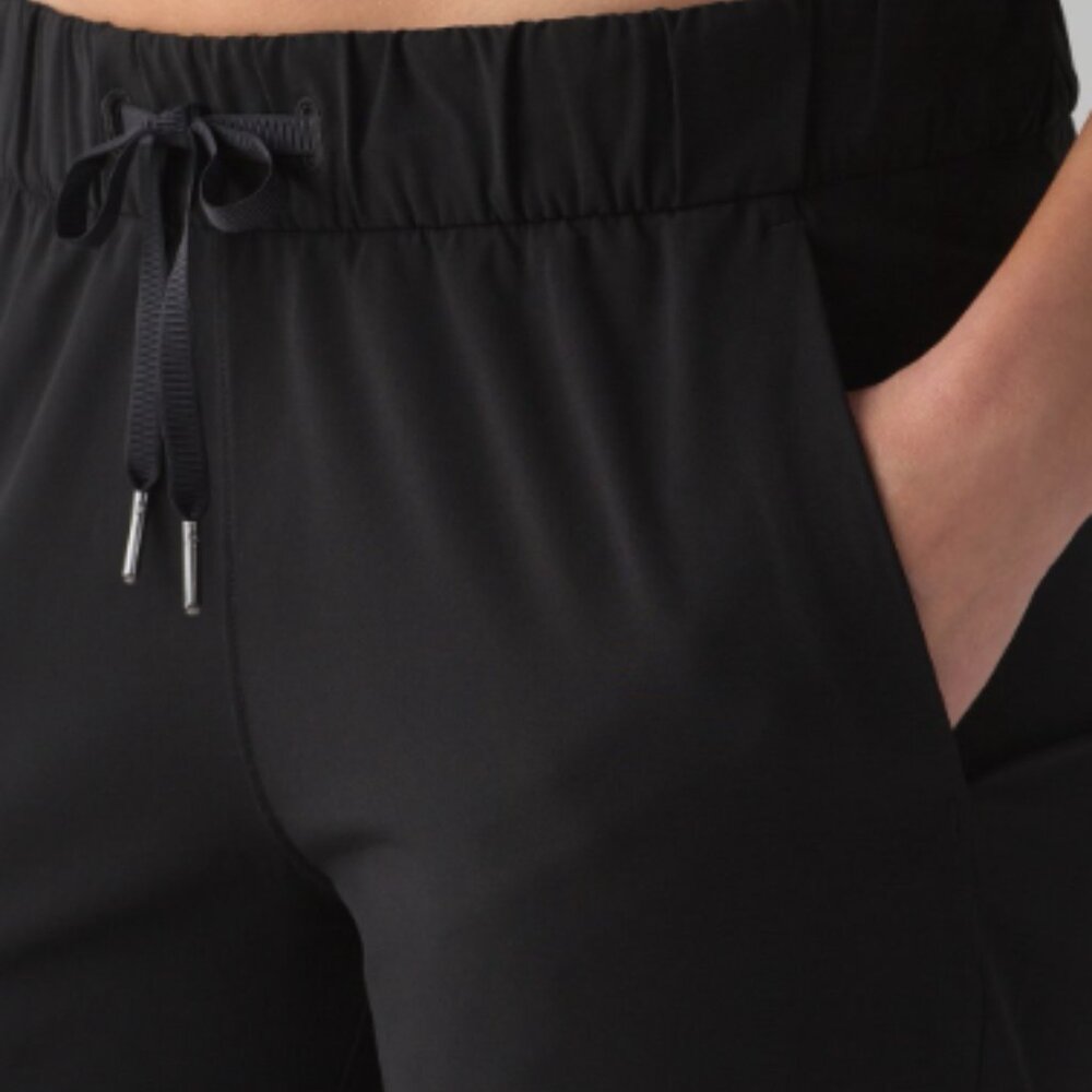 (6014) 🍋 LULULEMON On the Fly 7/8 Pant *Woven Sz 6 in Black - Picture 5 of 8